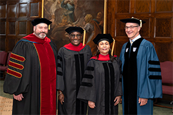 Rev. Jason Poling (left) and Dean Brent Laytham (right) flank 2022 D.Min. graduates of the Ecumenical Institute.