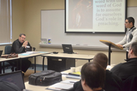 Professor and students in class.