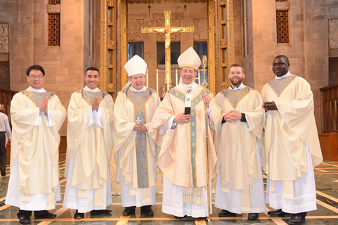 Fr. Ouma with Archbishop Lori and Bishop Madden at his ordination on June 6, 2015.